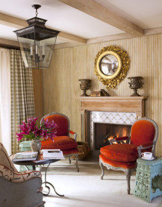 livingroom red chairs fireplace 0710 watson 03 xl Interior Design Blogs