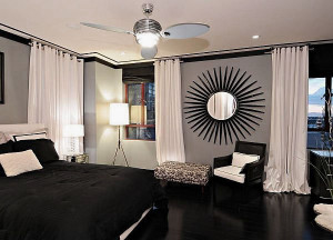 Striking Black and White Penthouse Bedroom Decor with Sun Mirror1 Interior Design Blogs