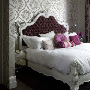 Bedroom with wallpaper and classic style bed Interior Design Blogs