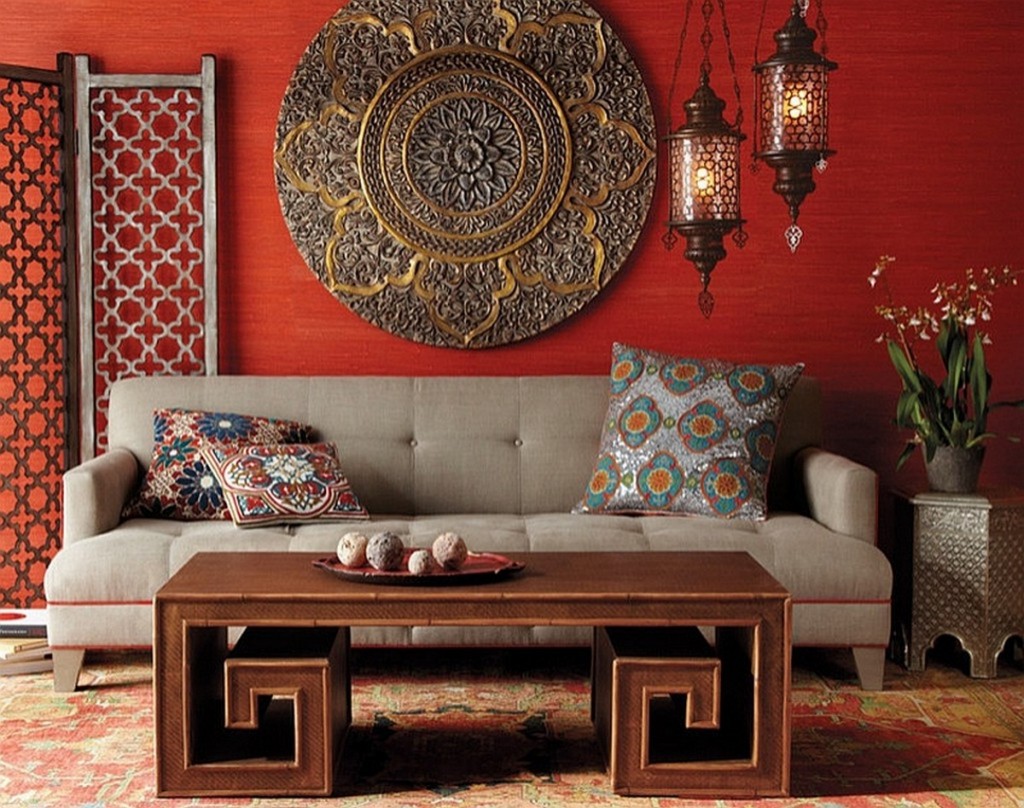 bold-colors-mixed-with-foamy-bright-grey-sofas-with-ethnic-cushion-cover-also-red-wall-painting-with-traditional-ornaments-also-vintage-pendant-lamp-1024x808