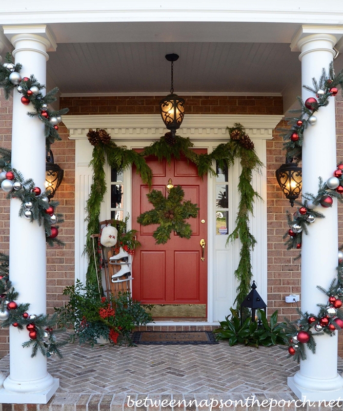 Decorating the Porch for Christmas with Garland Sled Ice Skates Muff and Snowflake Wreath 01 Interior Design Blogs