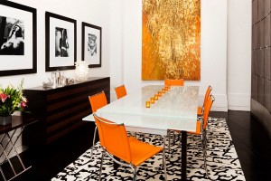 Posh dining room in orange black and a hint of gold Interior Design Blogs