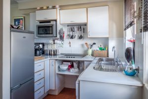 white-wooden-kitchen-cabinet